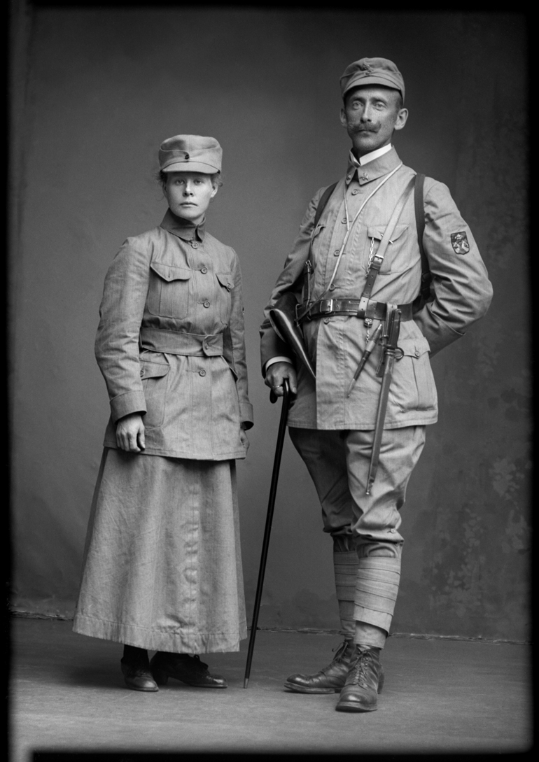 Civil Guard members, a man and a woman. Kuopio Cultural History Museum.